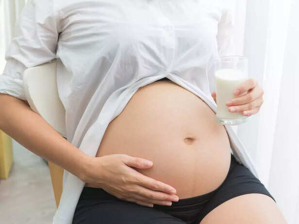 pregnant woman with milk