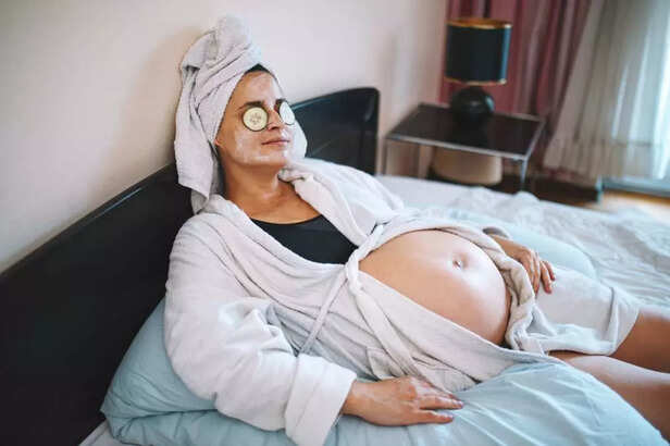 pregnant woman doing skincare