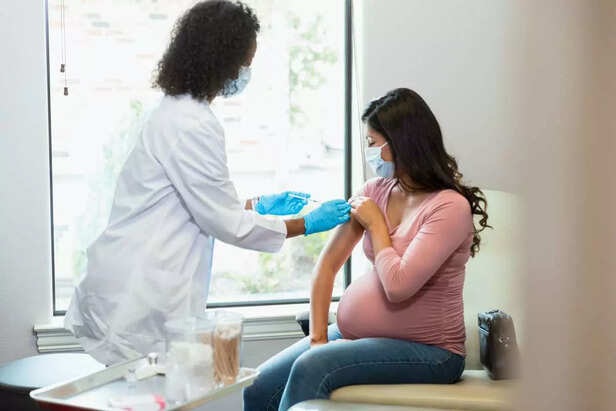 pregnant woman getting injection