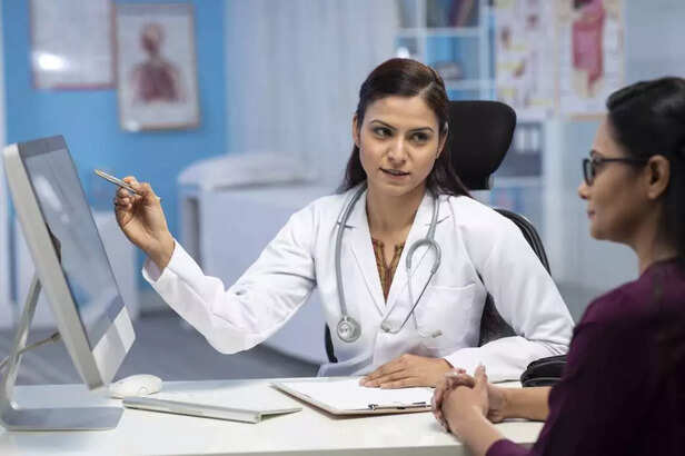 Doctor and patient are discussing the reports