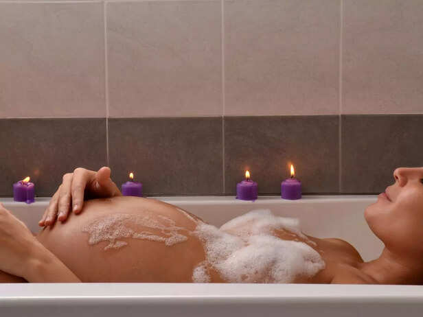 pregnant woman taking warm baths