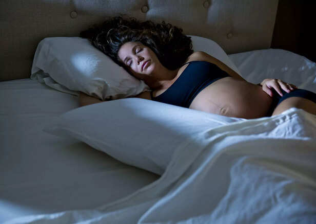 Pregnant Woman Sleeping at Night